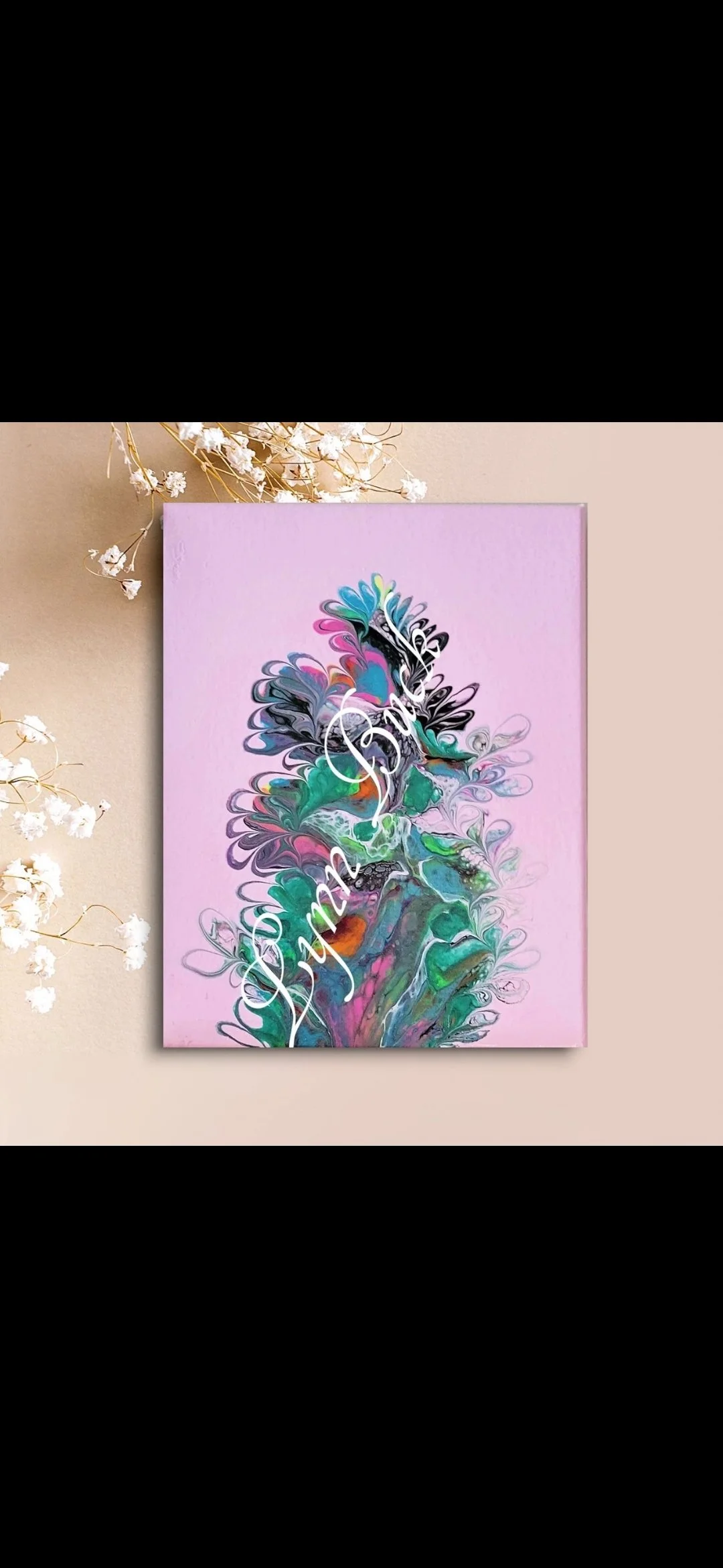Abstract painting with swirling colors of pink, teal, black, and white on a pink background, with the words "Shop Small" written in white cursive across the center. White flowers are placed beside the painting.