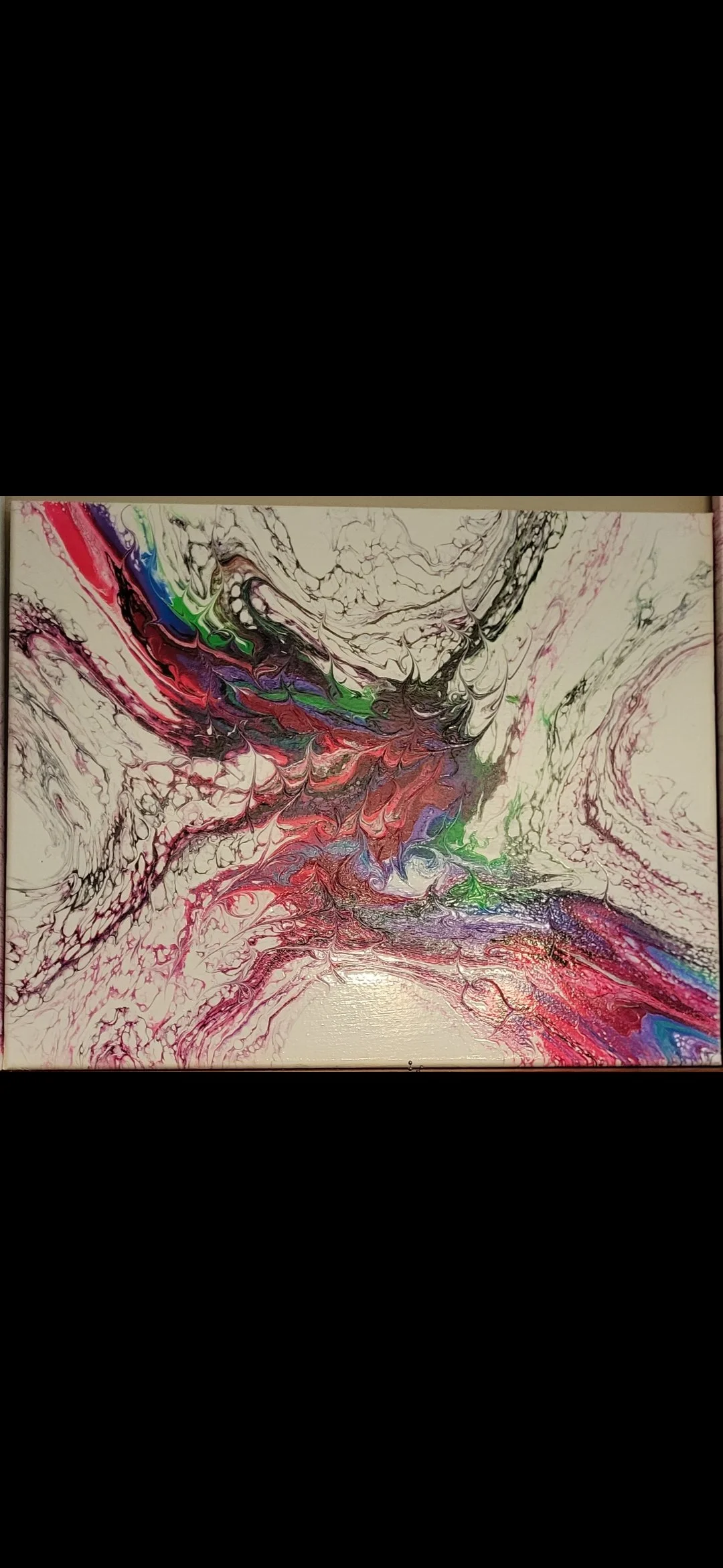 Abstract fluid art painting with swirling colors including red, purple, green, blue, and black on a rectangular canvas.