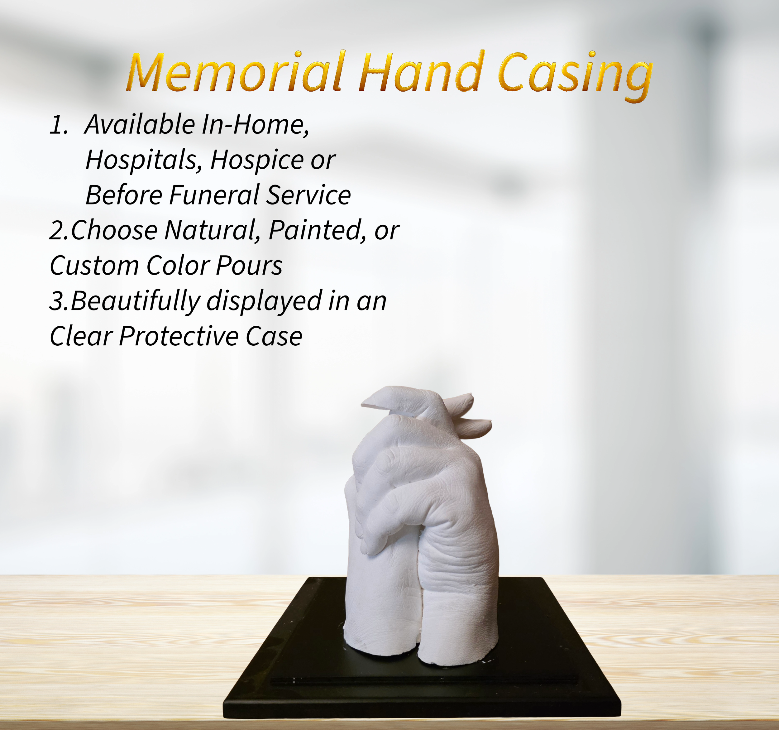 A memorial white hand cast displayed in a clear protective case on a black base. Signs next to it advertise the product for in-home, hospital, hospice, or funeral service use, available in natural, painted, or custom colors, and specifically highlight its decorative display.