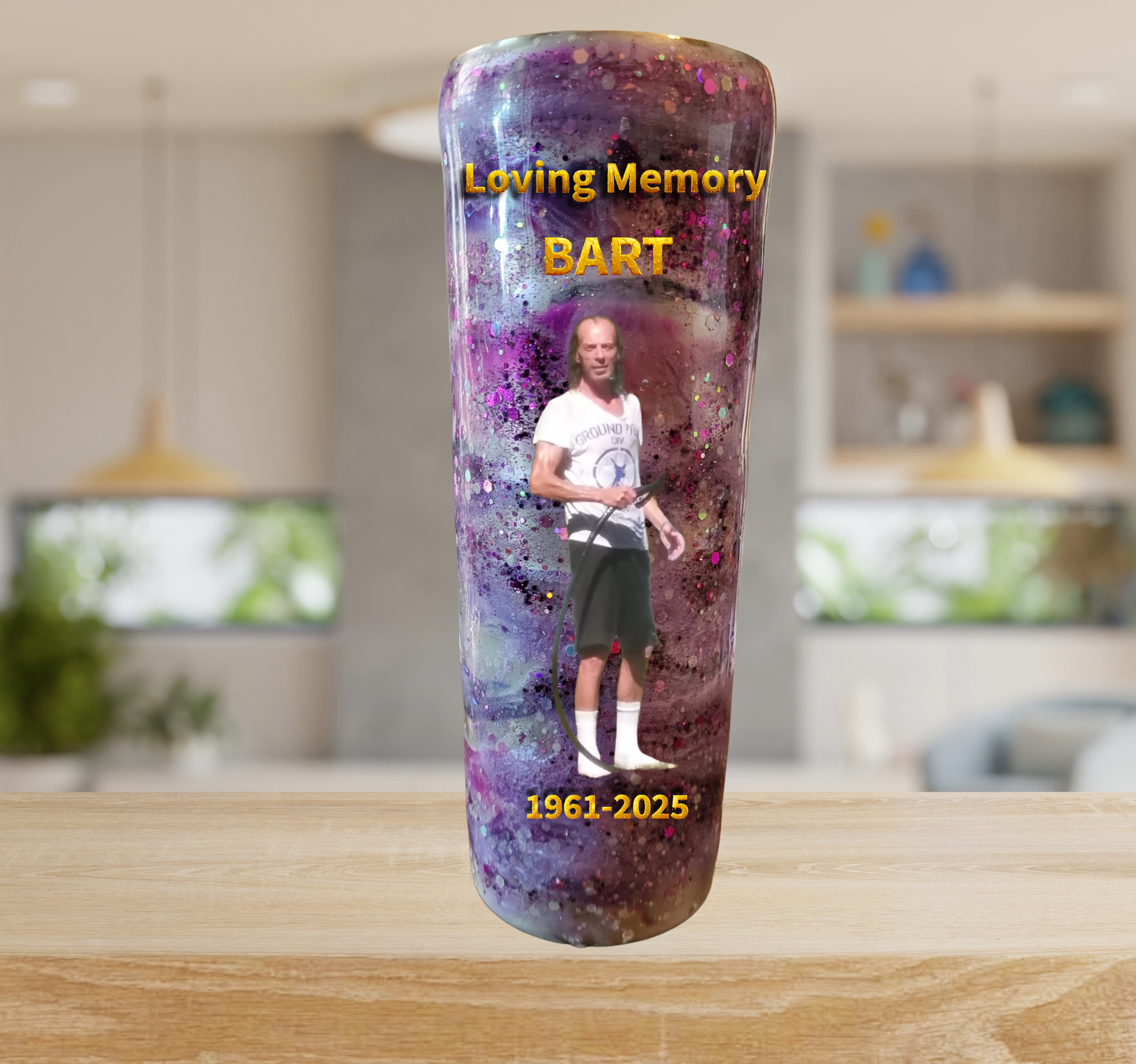 Memorial candle with galaxy design featuring a photo of a man holding a leash, and yellow text that reads "Loving Memory BART 1961-2025".