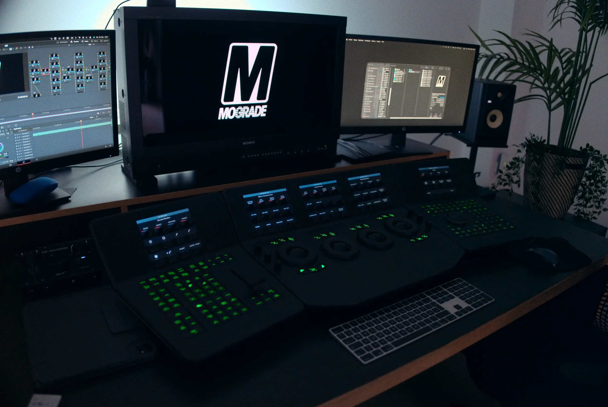 Close-up view of the set up in Suite 1 or 2, equipped with color grading and post-production monitors and panels.