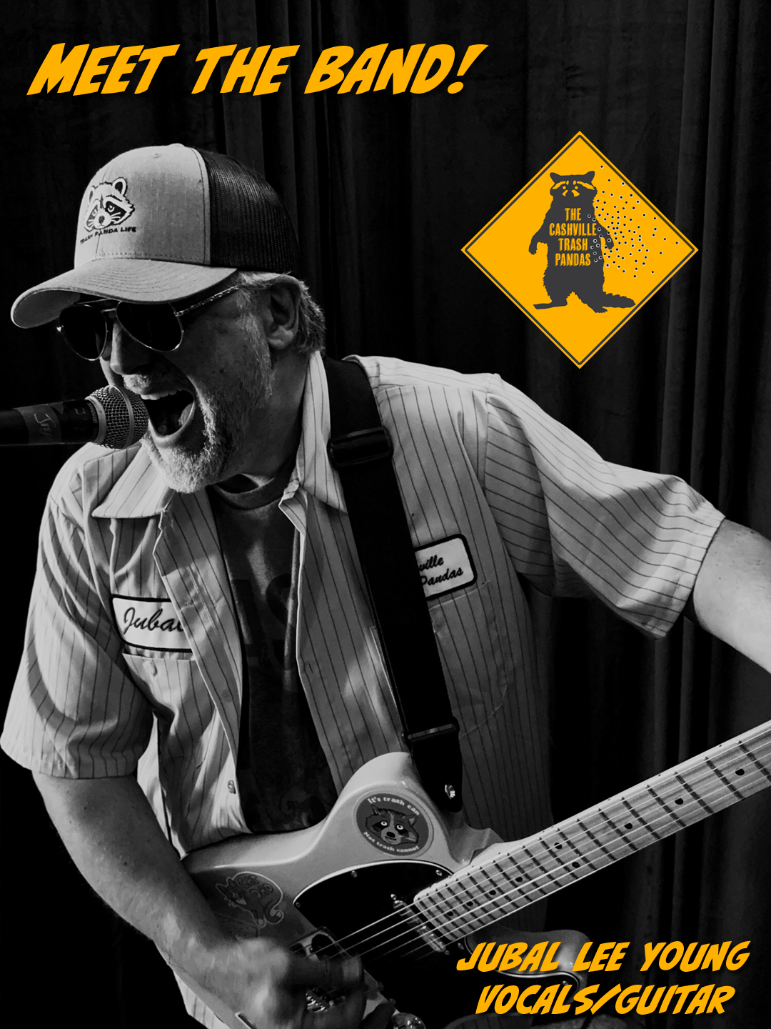 A black and white photo of Jubal Lee Young singing into a microphone while playing an electric guitar. He is wearing sunglasses, a cap with a raccoon emblem, and a striped shirt with a name tag that reads "Jubal". There is a logo for 'The Cashville Trash Cans' featuring a raccoon on a yellow diamond-shaped background. The text on the image says "Meet the Band!" at the top and "Jubal Lee Young Vocals/Guitar" at the bottom.