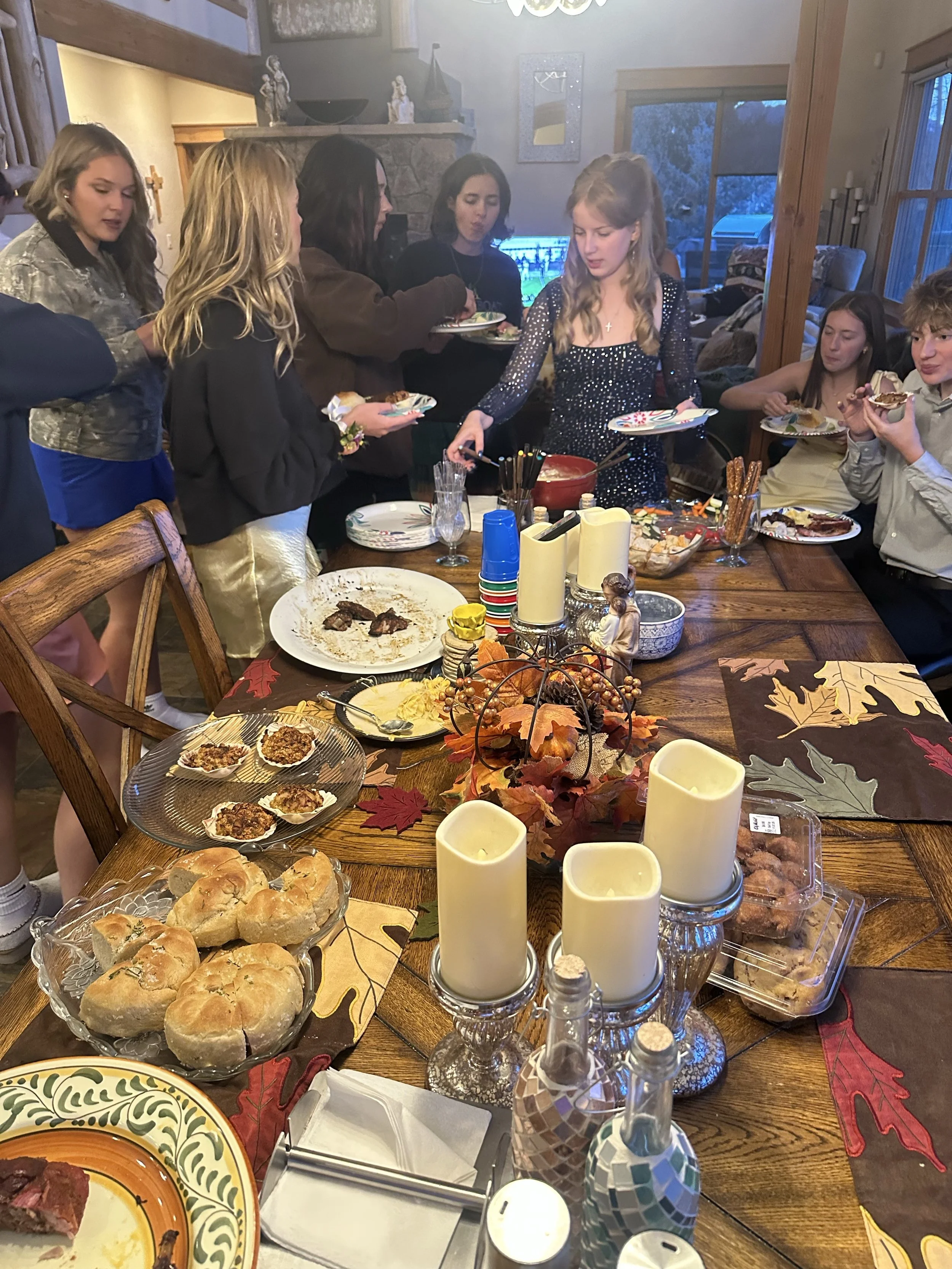 Field of white daisies with yellow centers in warm daylight.