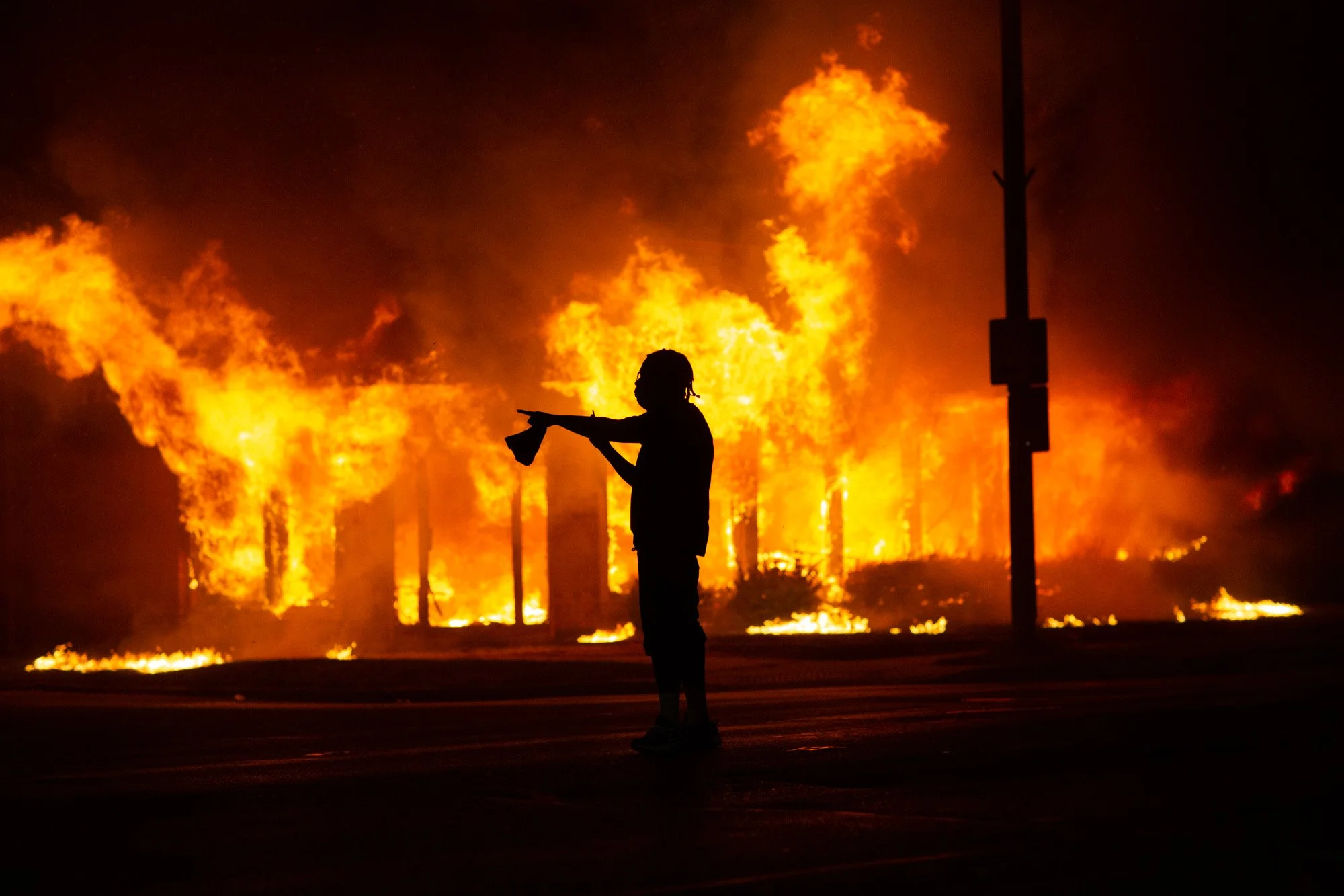 But this wasn't a movie. This was real life. There was real danger. Law and order had evaporated. It was a hot day. Shit was burnin all over the place. Everybody was on edge. Life was on pause because of the pandemic and then this explosion of fire.