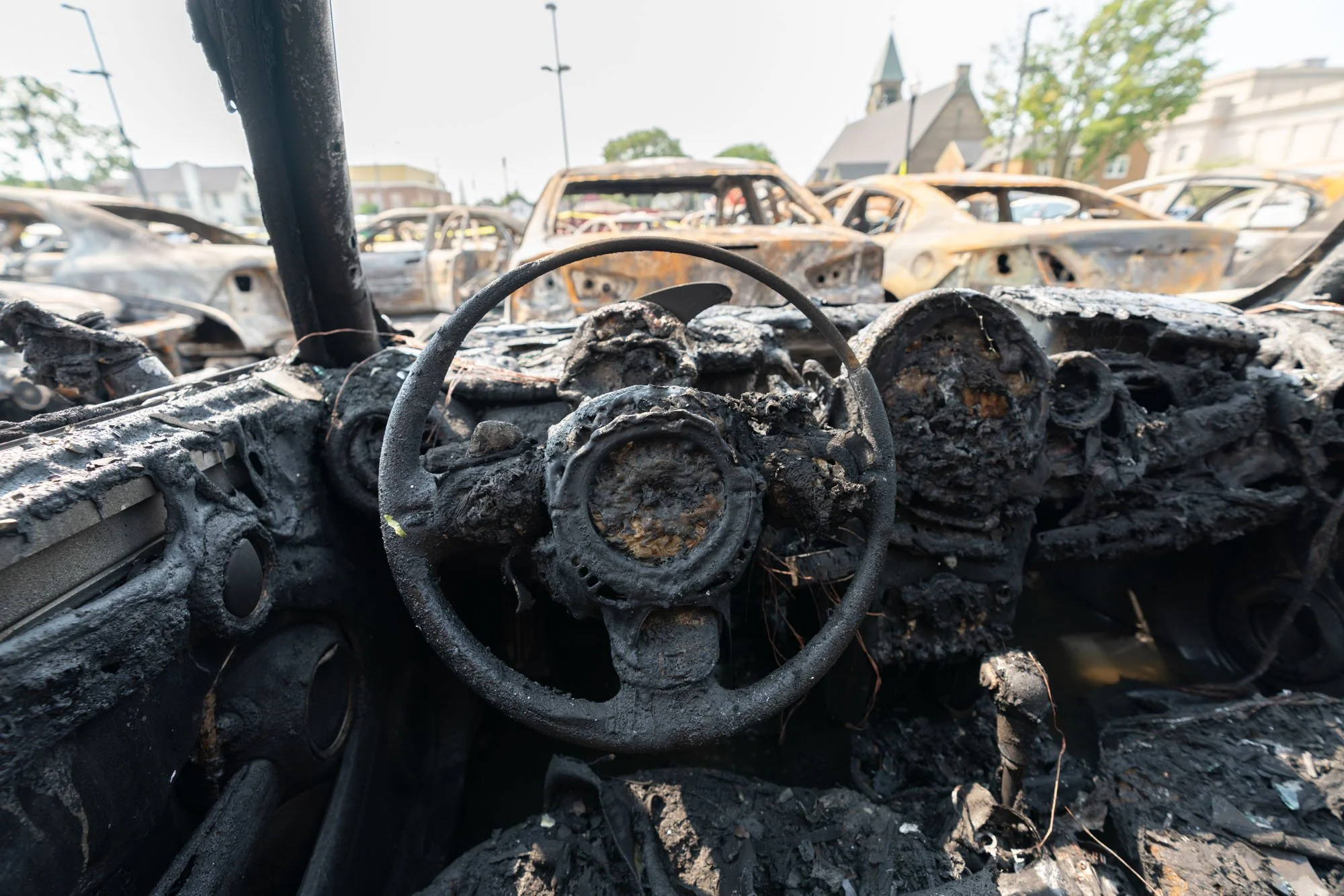An entire lot of cars had burnt. Again I imagined this as a painting. 