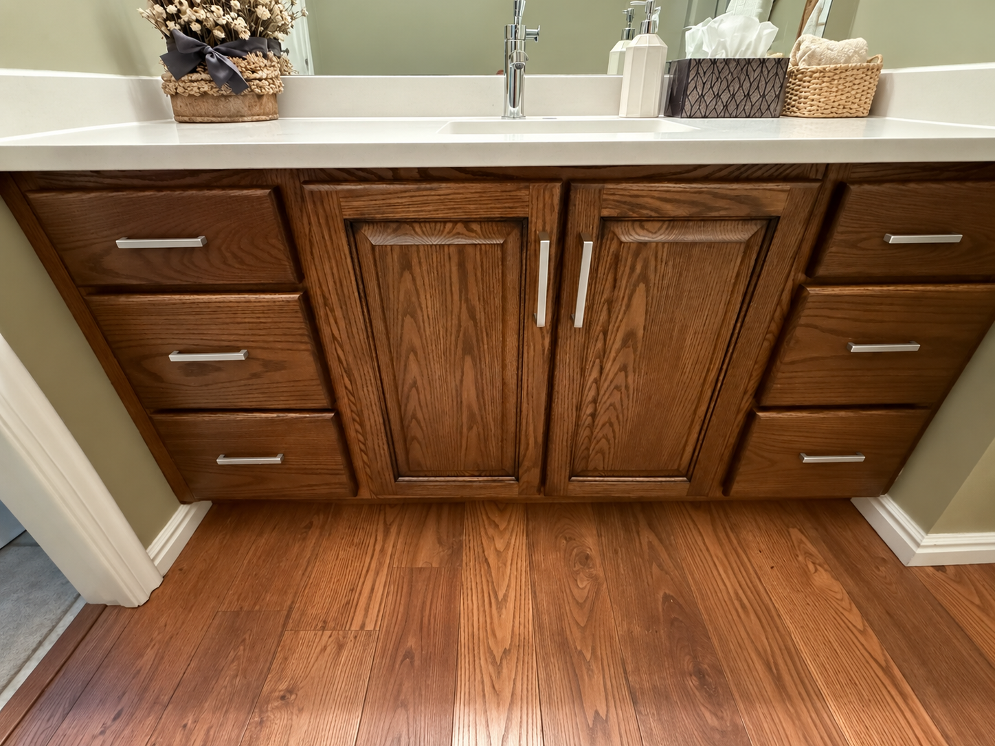 North Salt Lake bathroom vanity restained in a richer wood tone with updated hardware