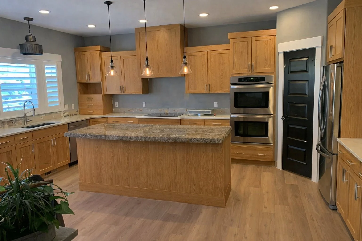 Existing oak kitchen cabinets before cabinet refinishing
