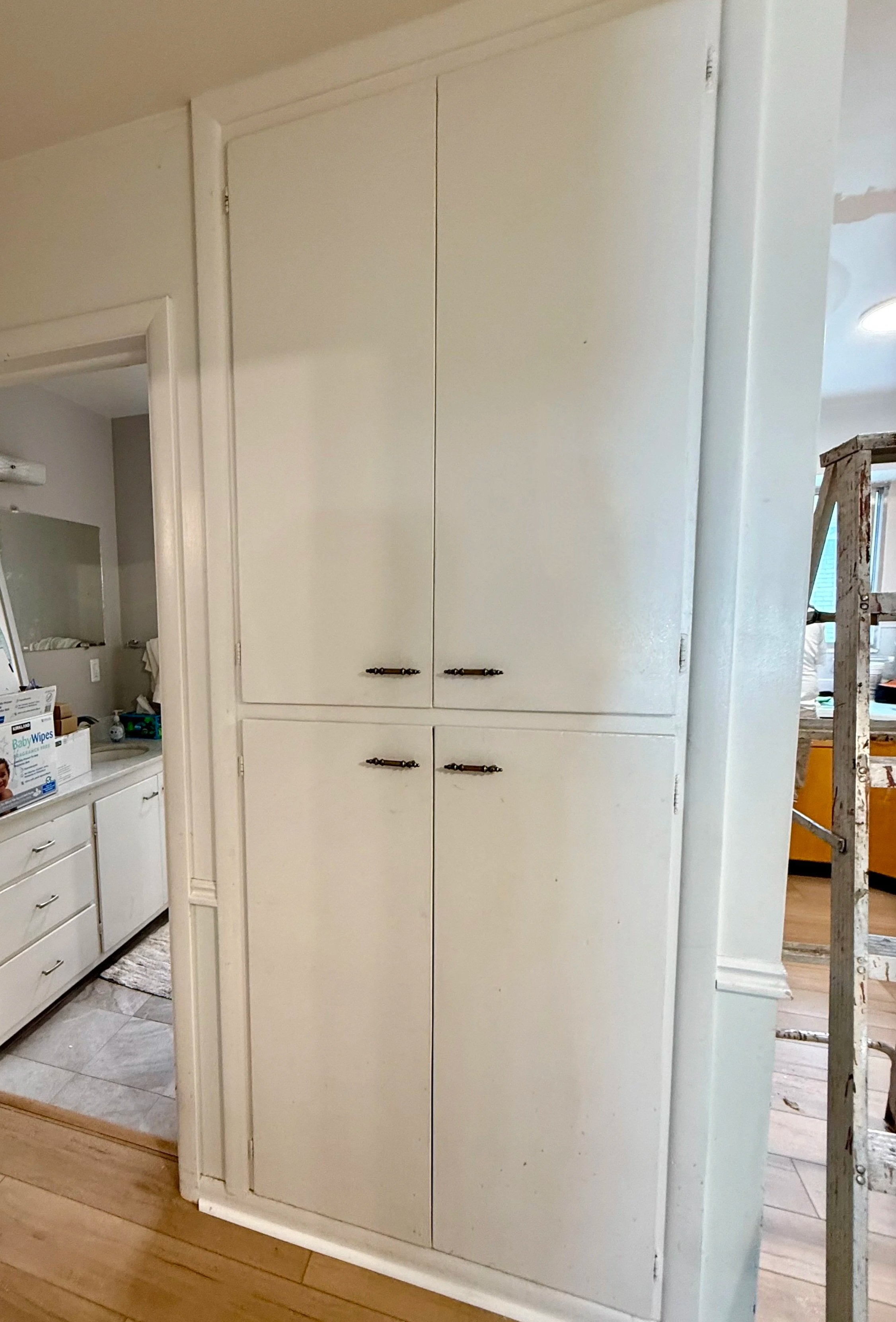 Original built-in cabinetry in Murray, Utah home before cabinet refinishing and new Shaker doors