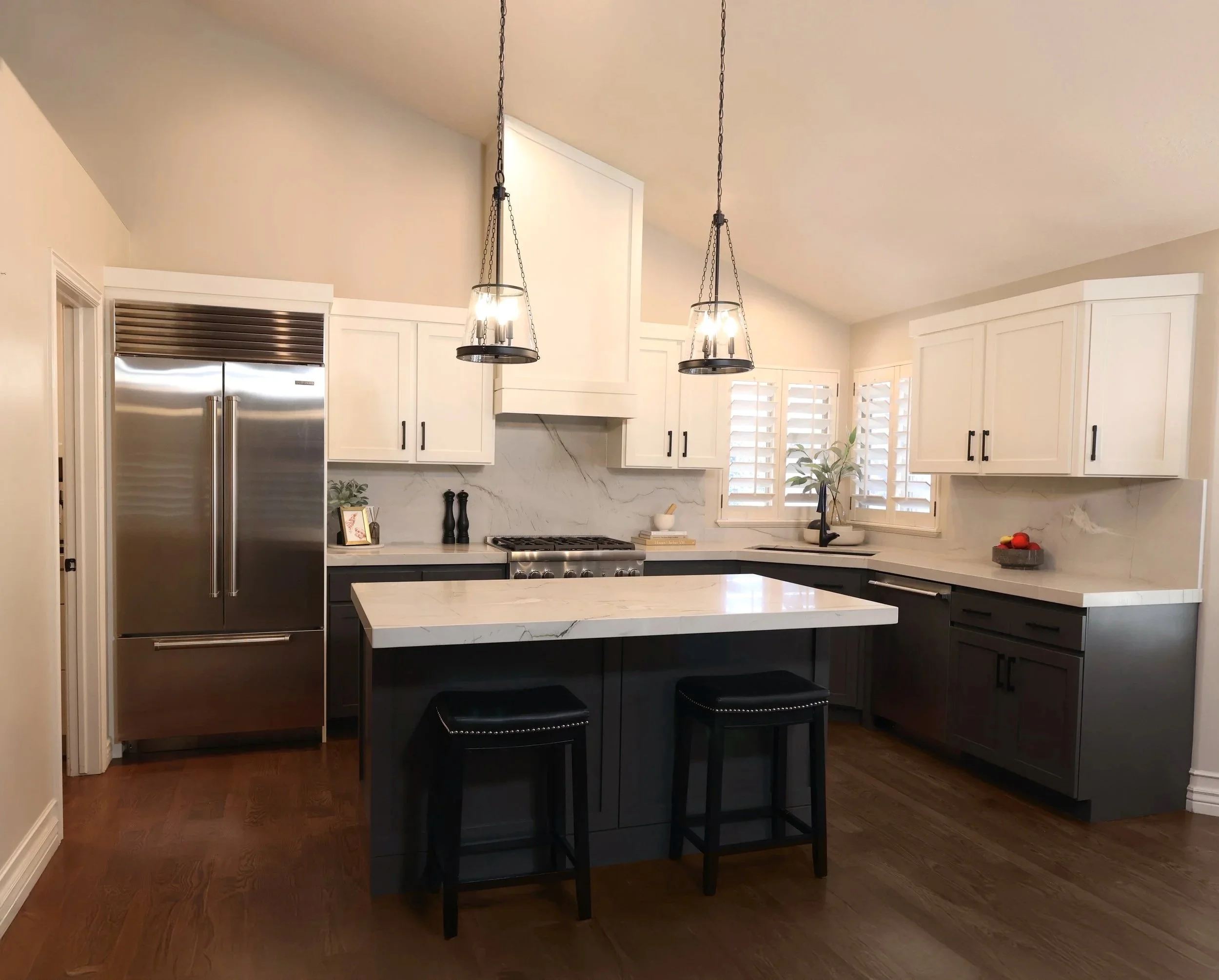 Custom cabinet door replacement with factory-finished doors, quartzite stone countertop, and full-height stone backsplash installation in Wasatch Front home