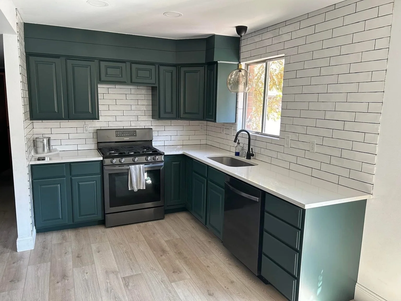 A dramatic transformation through color, finish, and detail. 
 
Deep green cabinetry completely redefined this kitchen while preserving the original footprint. 
 
 
#CabinetRefinishing #KitchenTransformation #greencabinets #utahhome #BeforeAndAfter