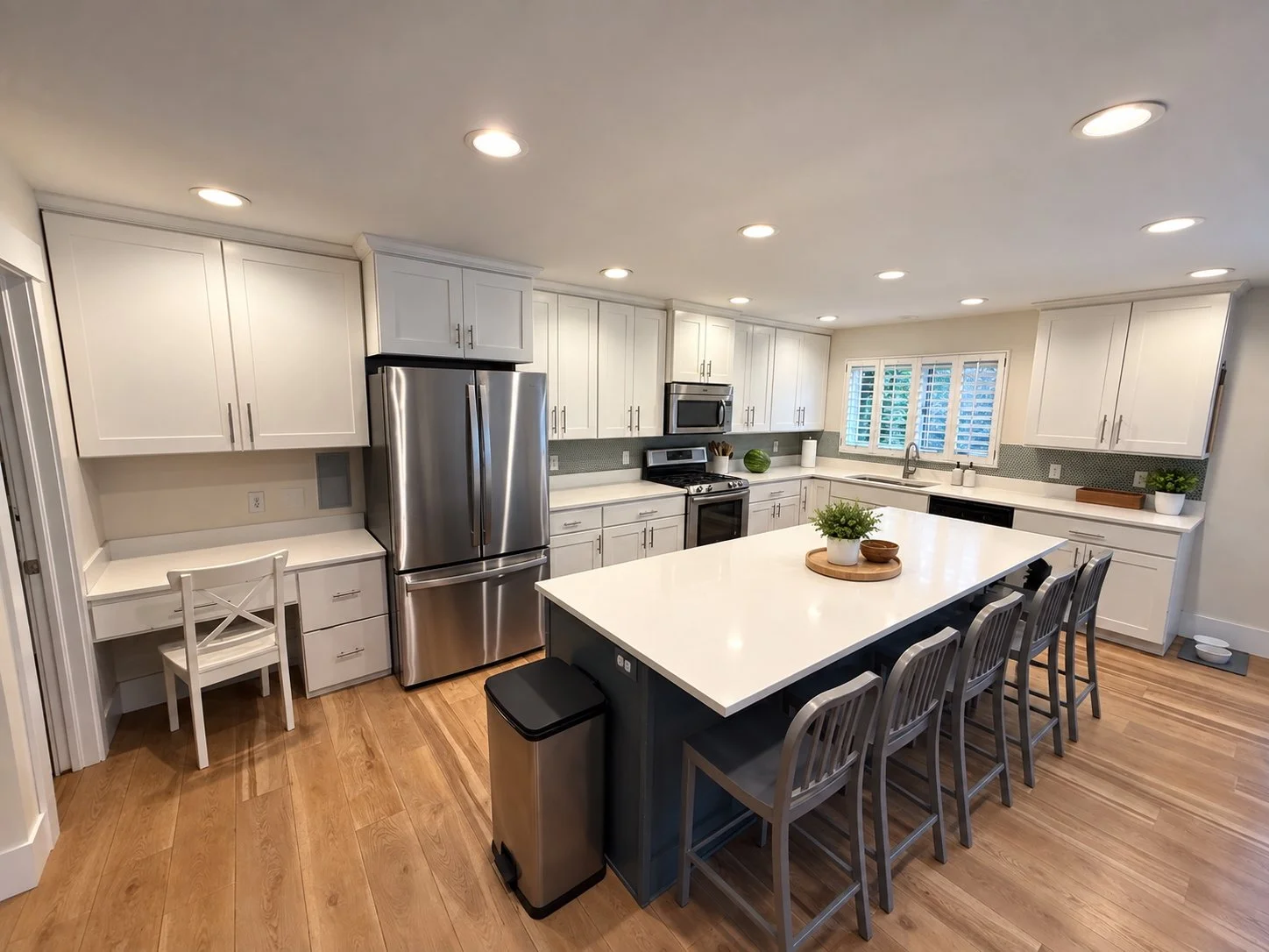 BEFORE | Holladay, Utah Kitchen Before Cabinet Transformation: 
Existing kitchen cabinetry prior to CAZI’s transformation, with several cabinet doors showing damage and wear. The project included replacing the existing doors and drawer fronts with ne