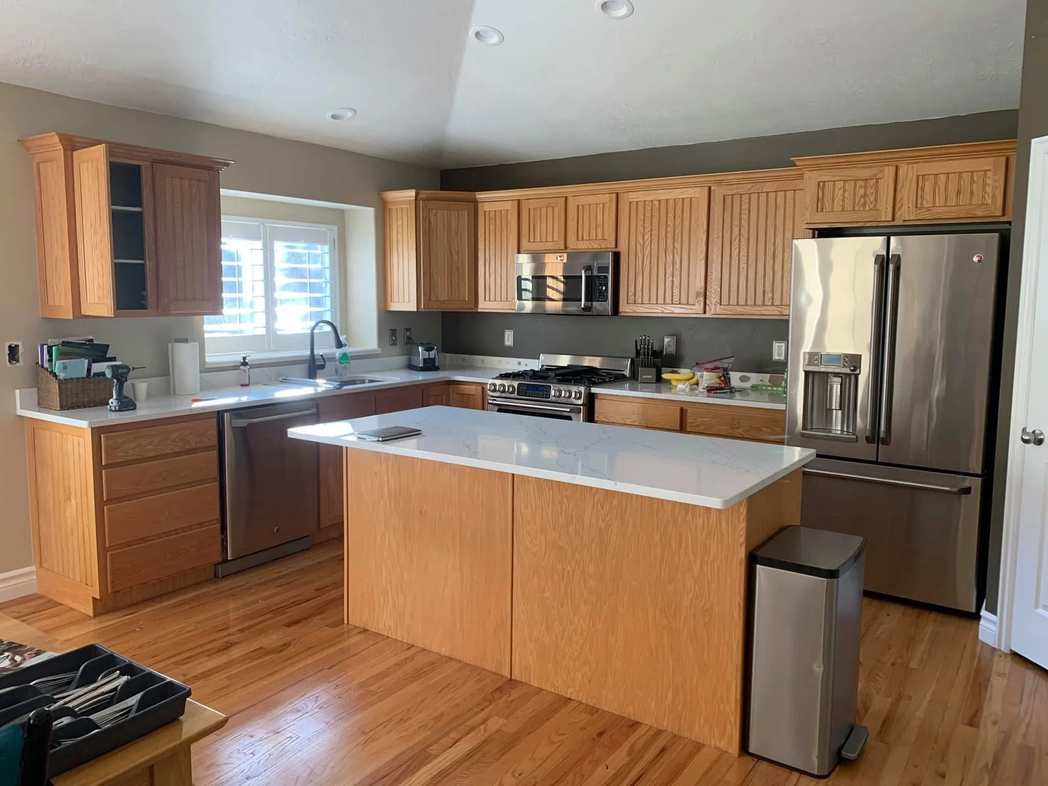 Existing oak kitchen cabinets before cabinet refinishing