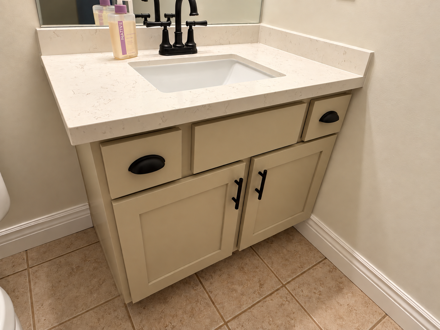 North Salt Lake bathroom vanity refaced with new Shaker doors and drawer fronts in Sherwin Williams Windsor Greige with new quartz countertop