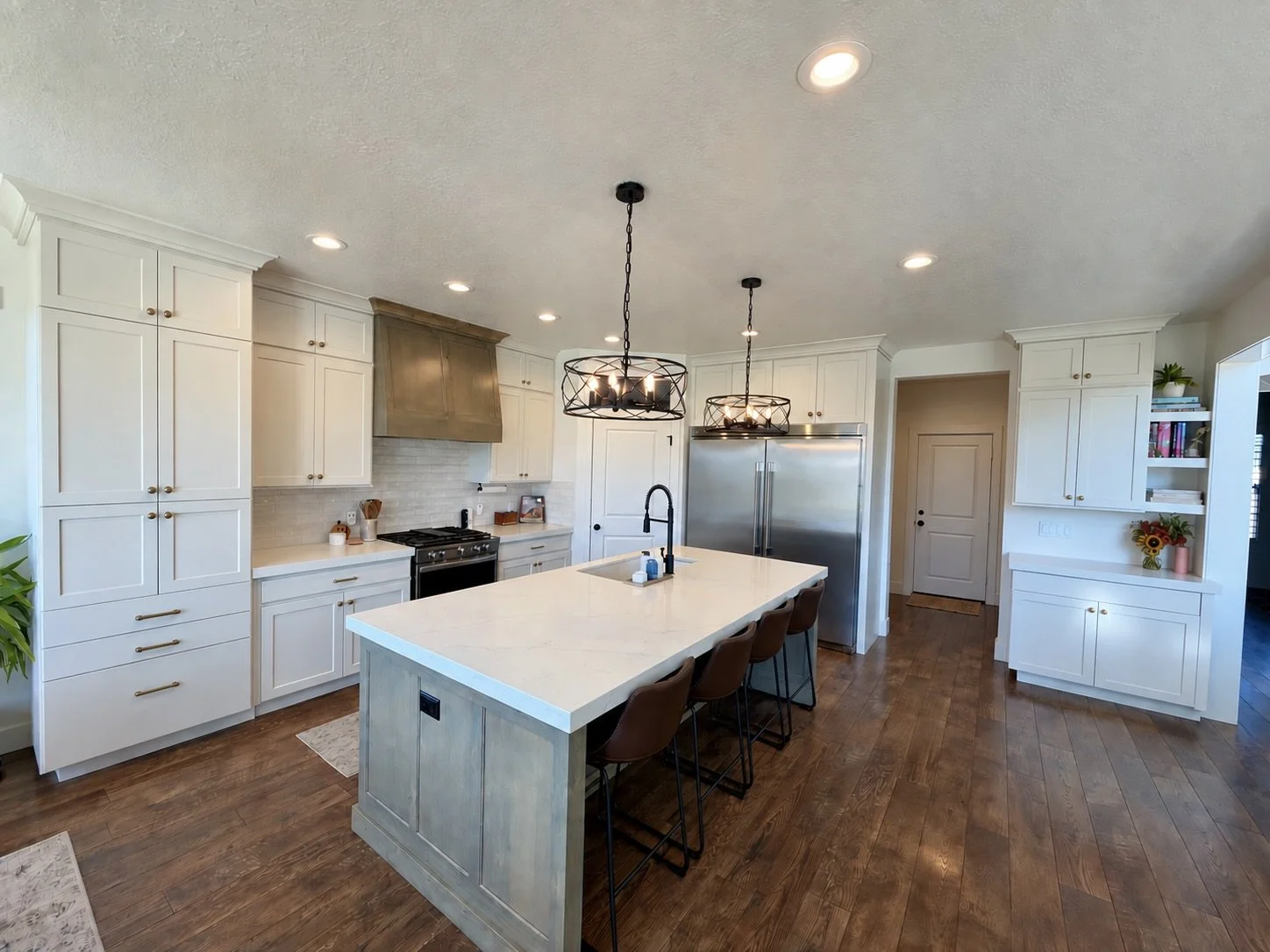 Lehi Utah kitchen after cabinet refinishing with new custom cabinets, refrigerator cabinetry and floating shelves