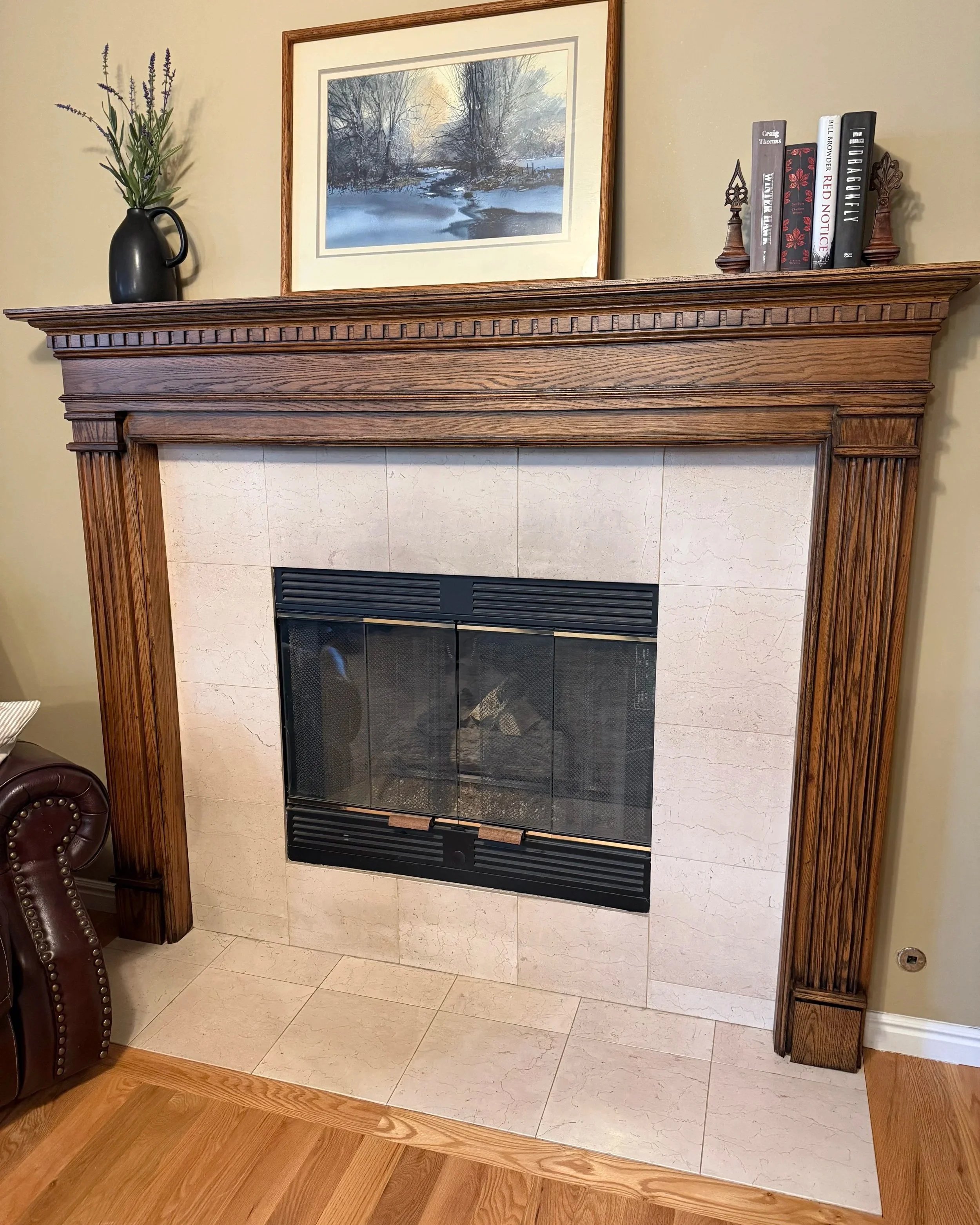 North Salt Lake wood fireplace surround professionally restained in a richer, darker wood tone