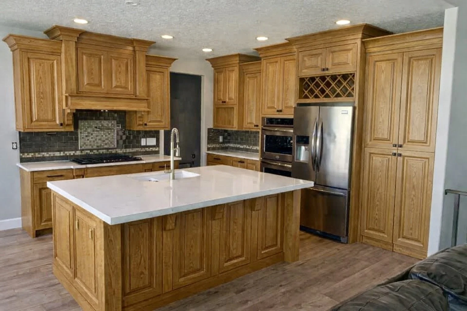 Existing oak kitchen cabinets before cabinet refinishing