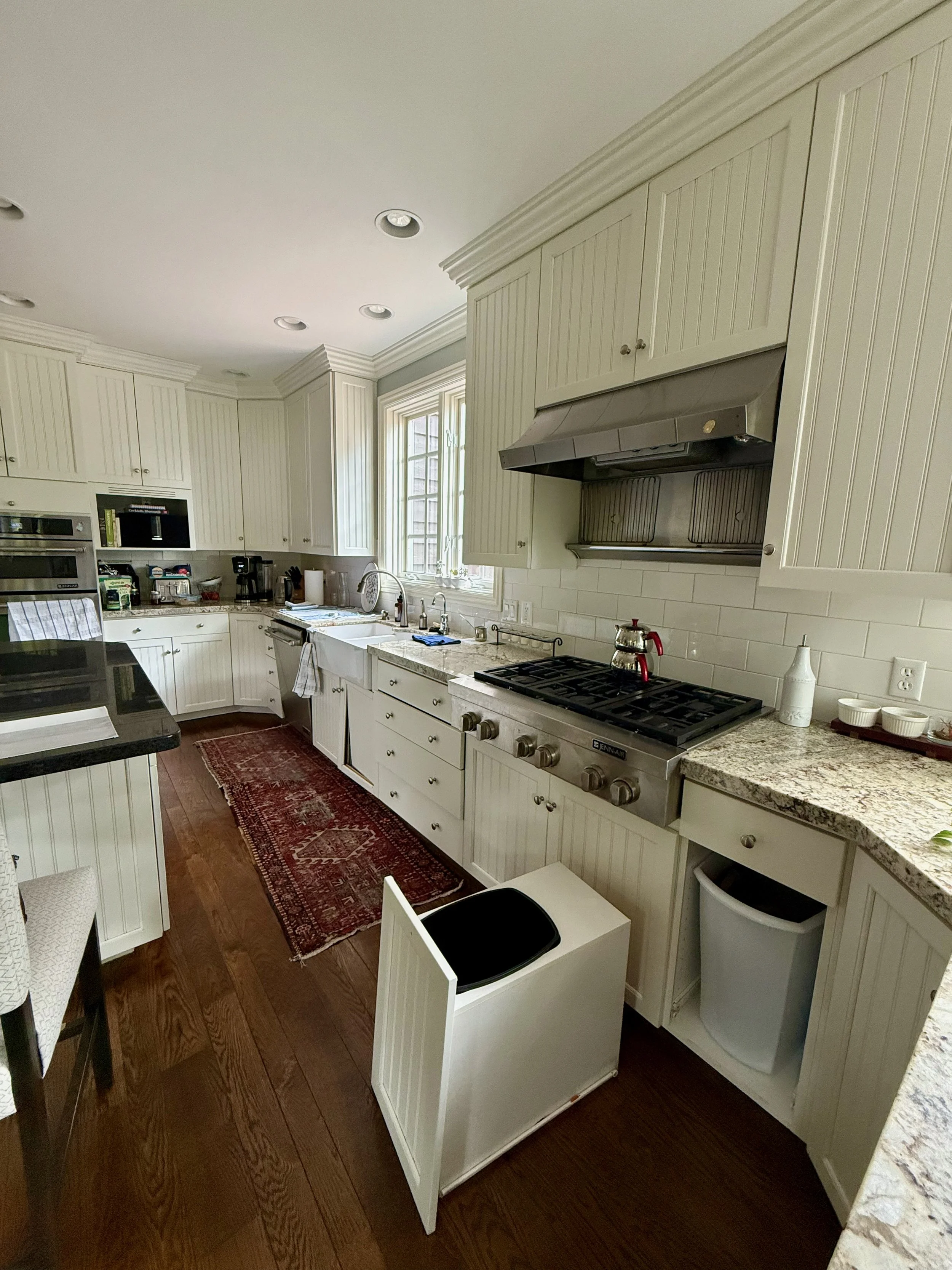 Worn Holladay, Utah kitchen cabinets with broken doors and drawers before refinishing and restoration