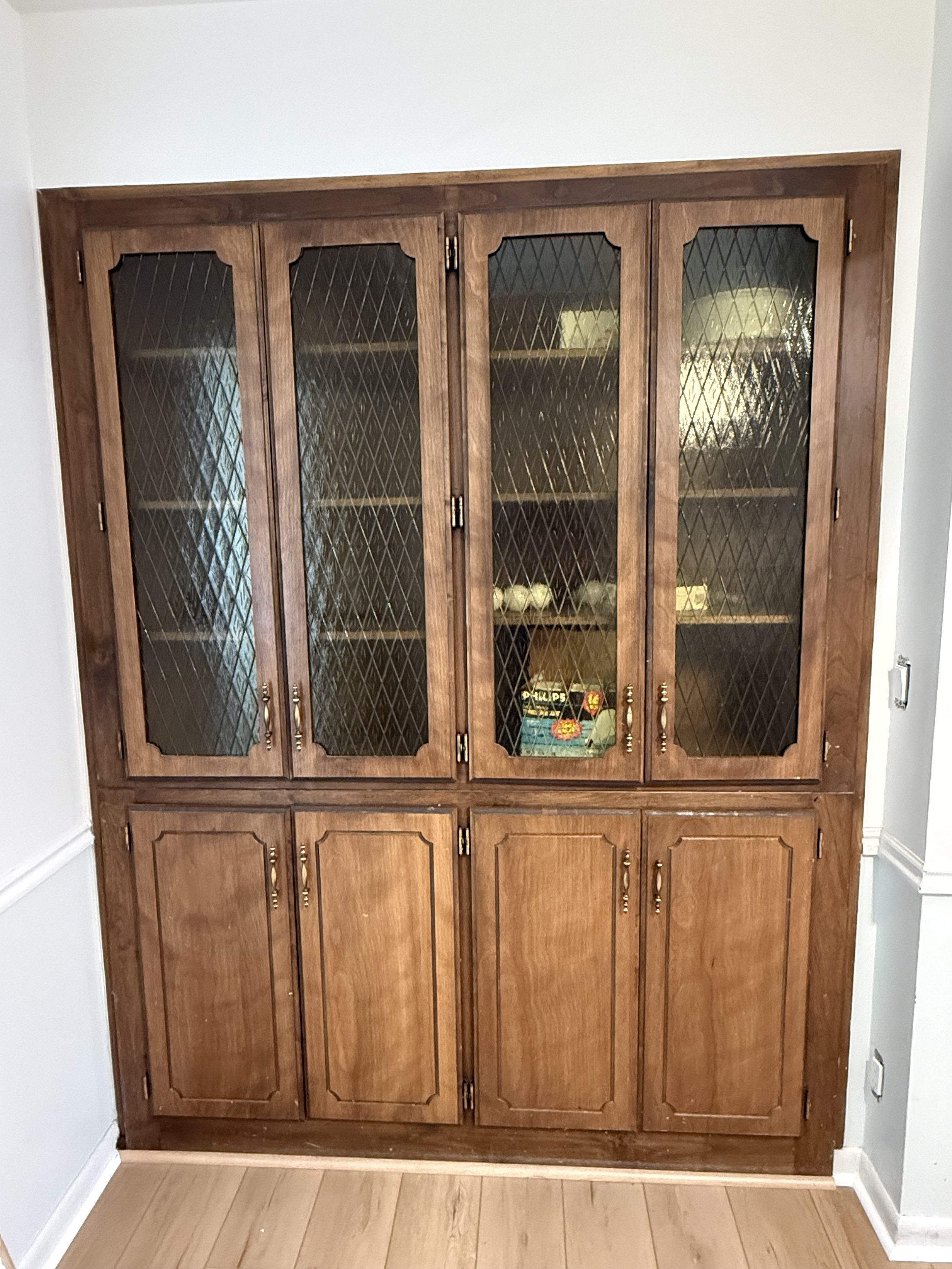 Original wood built-in cabinets in Murray Utah before new Shaker doors and soft-close hinges