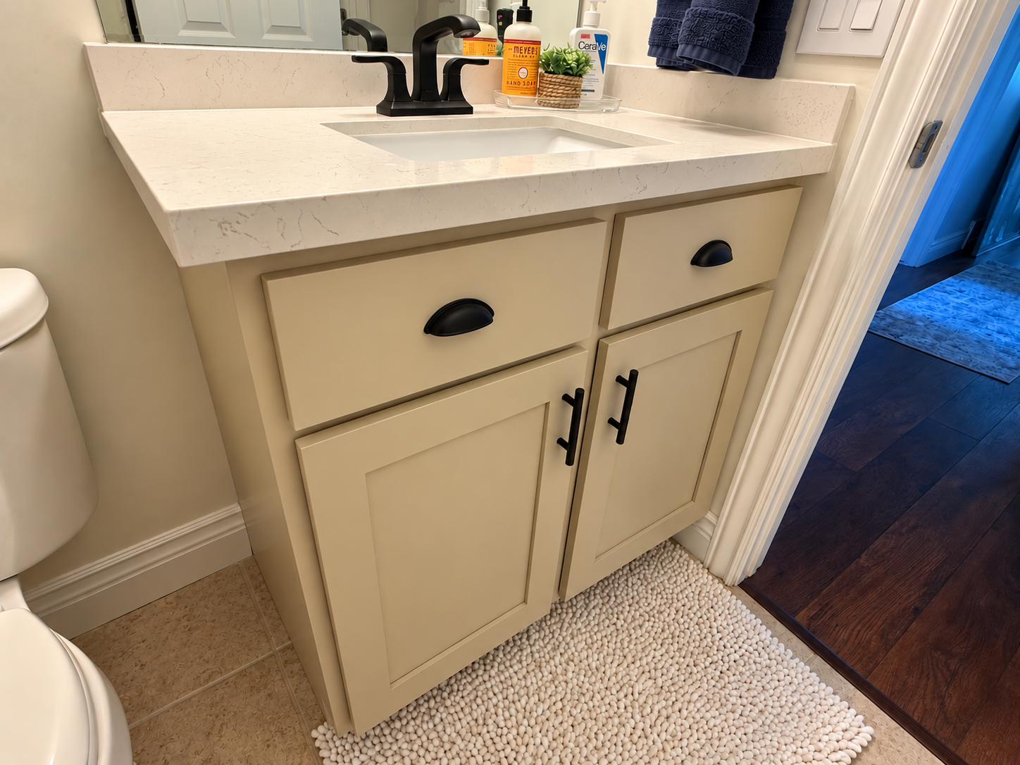 North Salt Lake bathroom vanity updated with new Shaker cabinet doors and drawer fronts in Sherwin Williams Windsor Greige with new quartz countertop