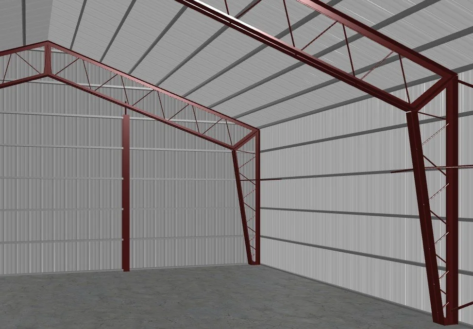Interior of a metal storage or warehouse building with metal walls and a high ceiling supported by red steel framework.