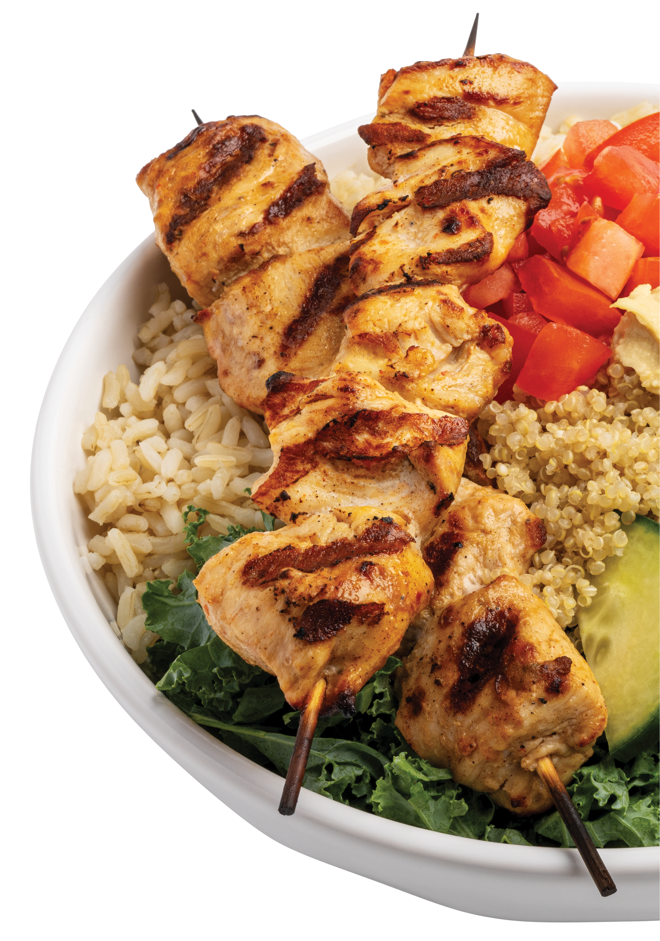Bowl of grilled chicken skewers with rice, quinoa, and fresh vegetables, including tomatoes, cucumber, and leafy greens.