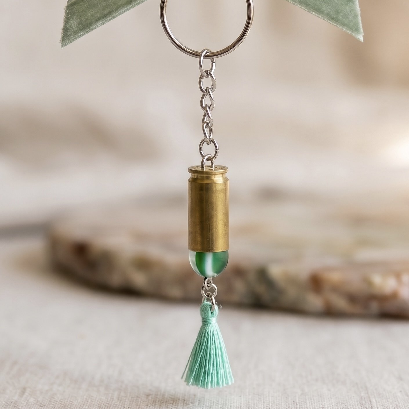 .40 Cal Brass with Light Blue Dangle