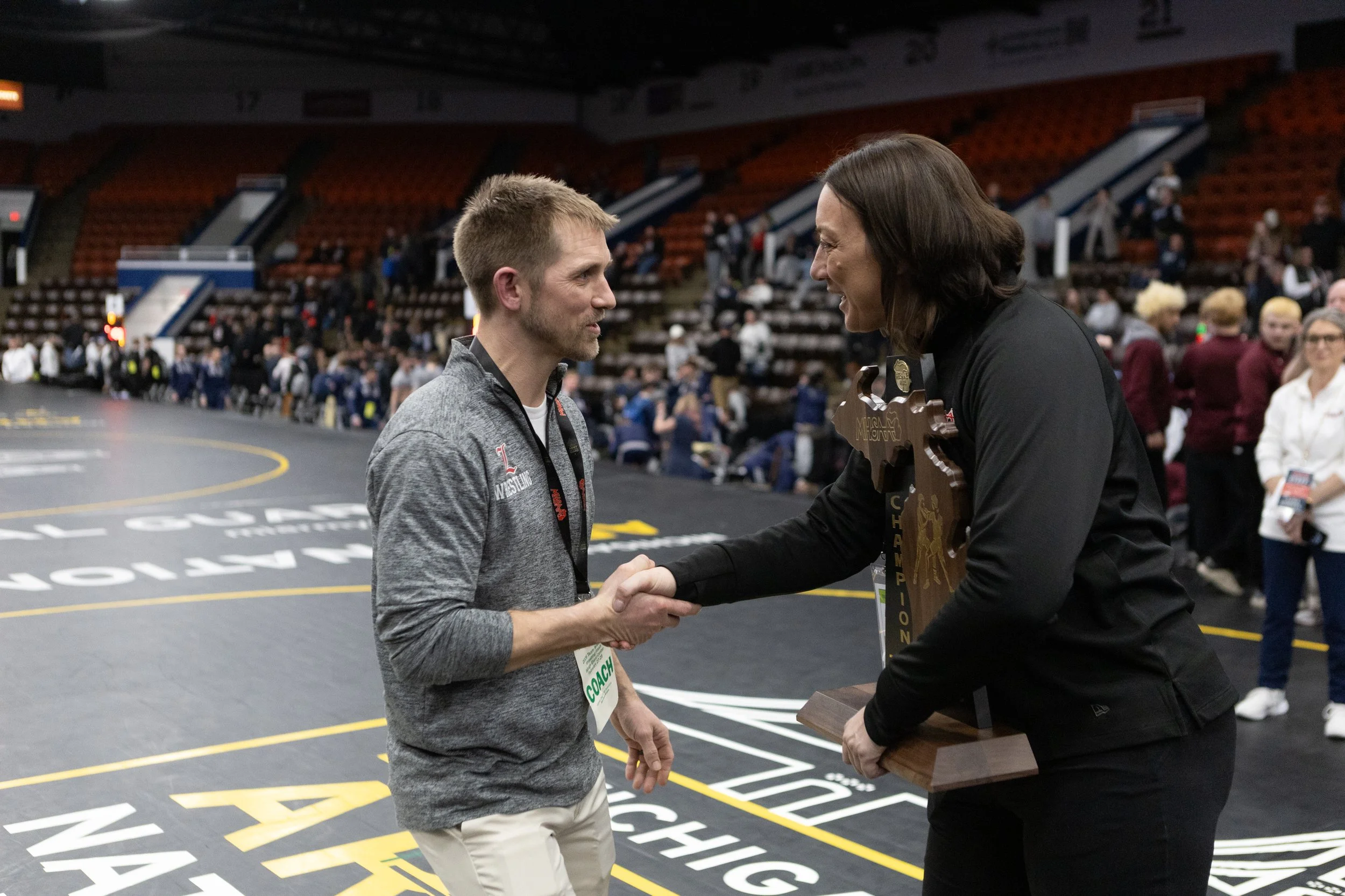 Wrestling - Lowell Stays Division 2… Barely.