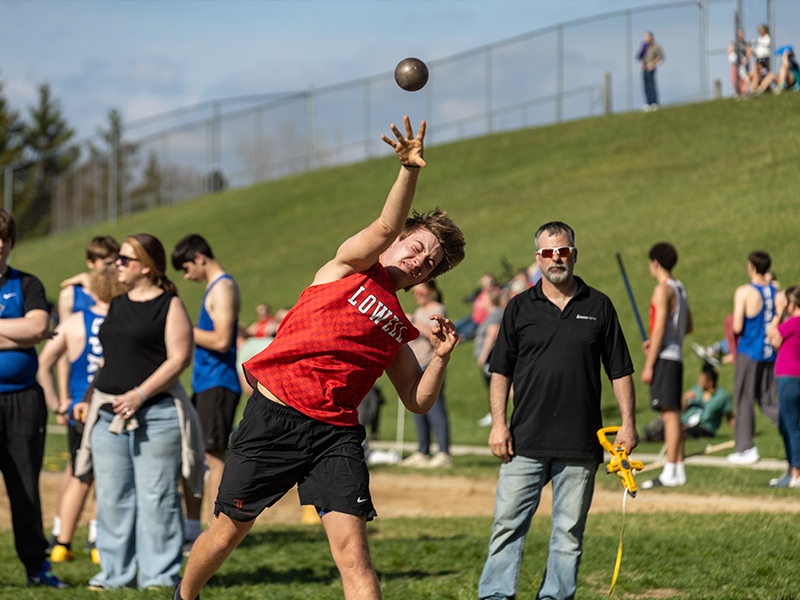 Lowell Splits Quad Meet, Tops Kenowa Hills and Falls Narrowly to Coopersville