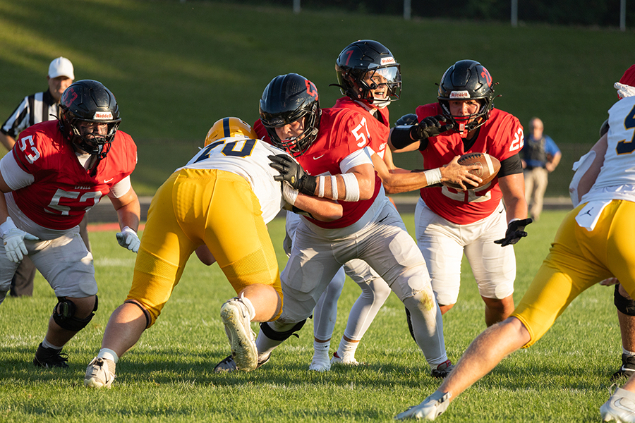 Football Team Opener Spoiled By Rival Pioneers 27-21.
