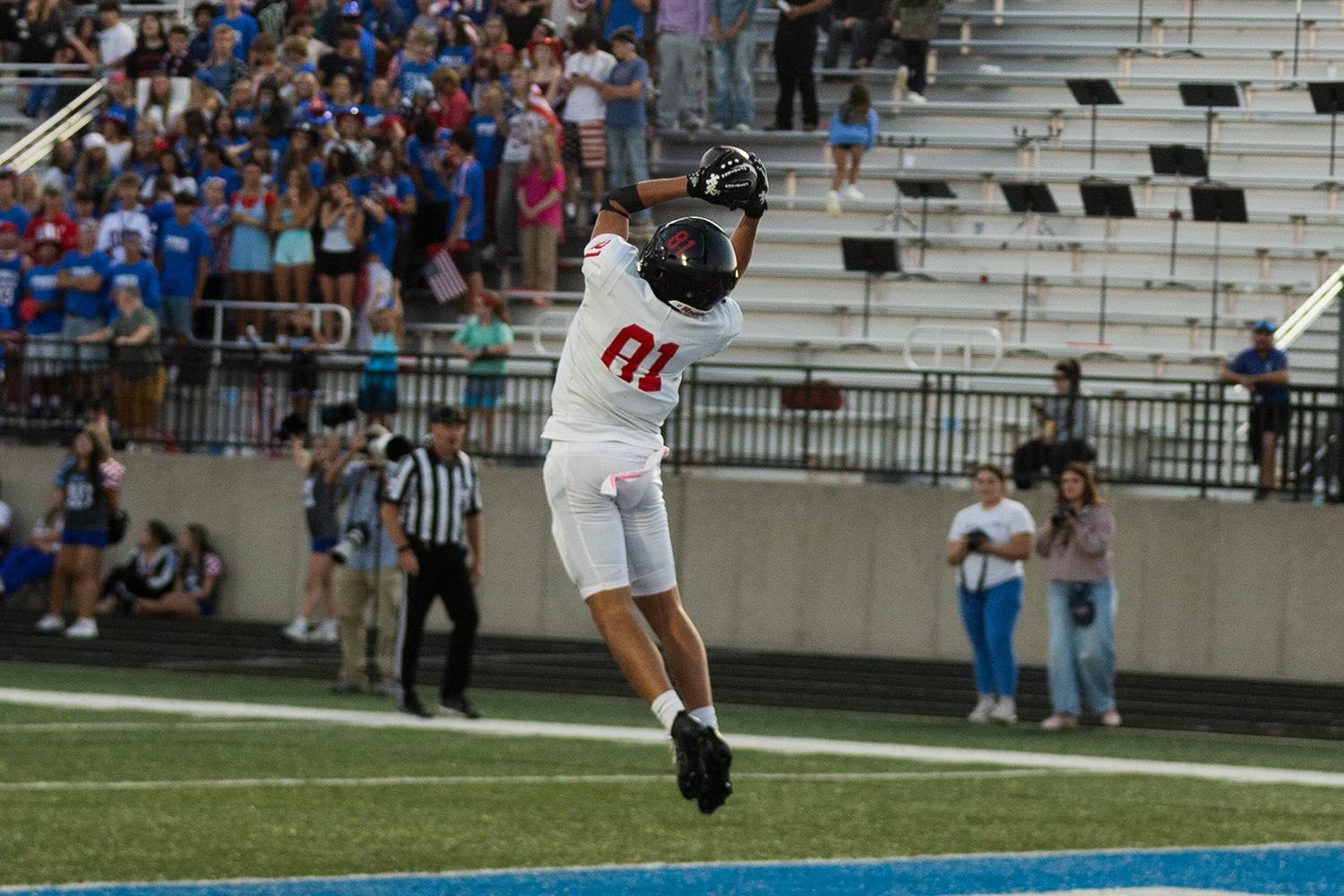 Lowell Runs Wild Over Sparta, Wins 61-24