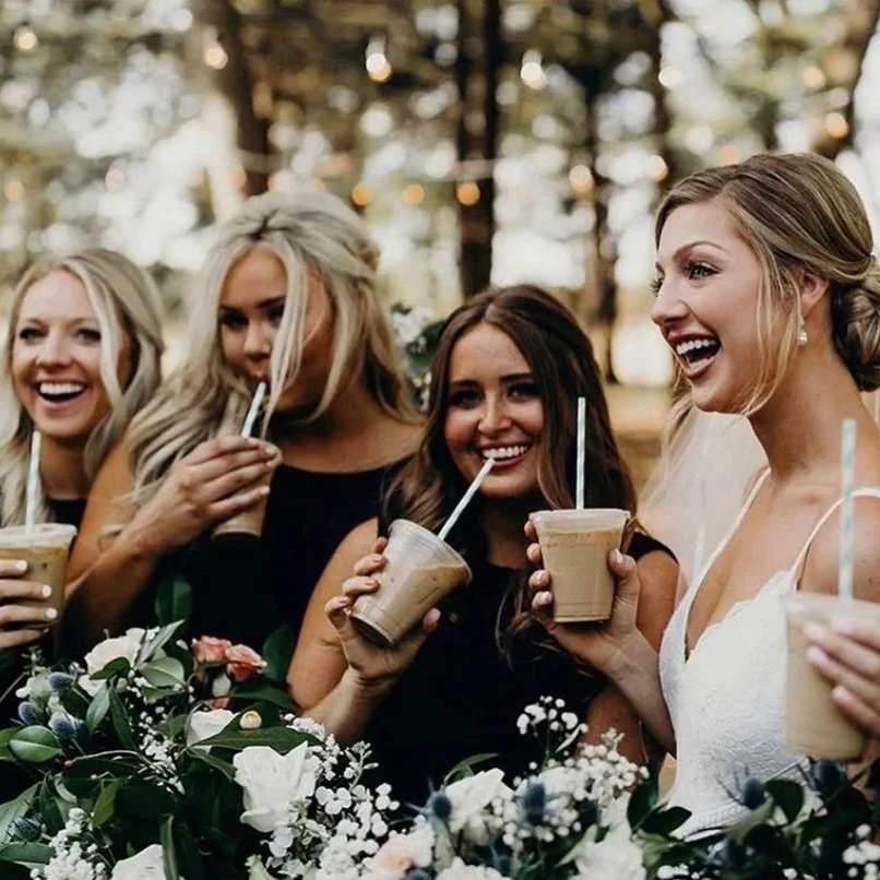 Bride and bridal party drinking iced coffee at a Wildshine Coffee wedding event.