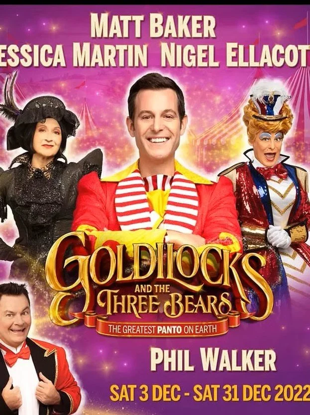 Promotional poster for "Goldilocks and the Three Bears" performing from December 3 to December 31, 2022, featuring actors Matt Baker, Jessica Martin, Nigel Ellacott, and Phil Walker in colorful costumes against a vibrant purple background.