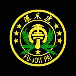 A circular emblem with a black background, featuring yellow and green design elements, including Chinese characters at the top, stars around the circle, and the words 'FU-JOW PAI' at the bottom.