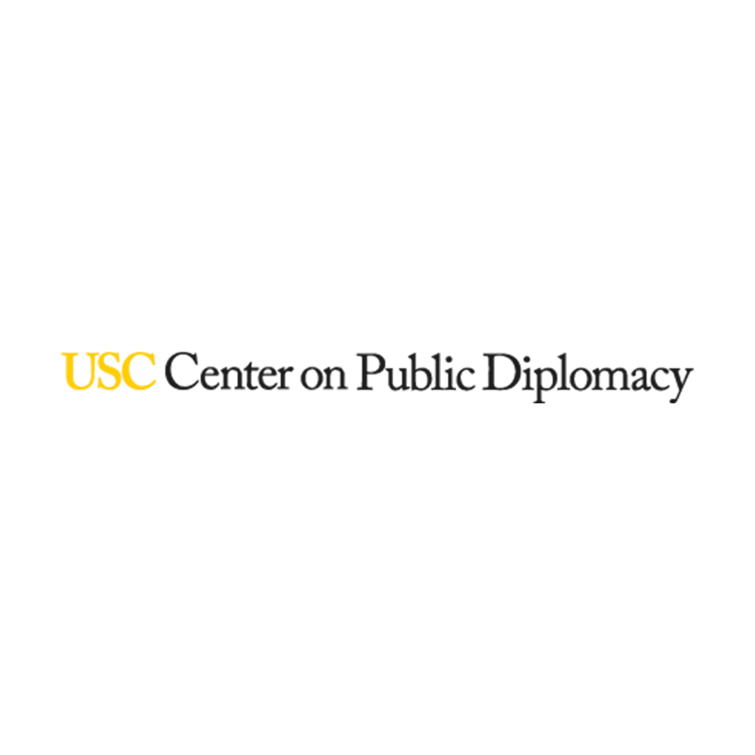 Black silhouette of a cat with a yellow stripe across its tail.