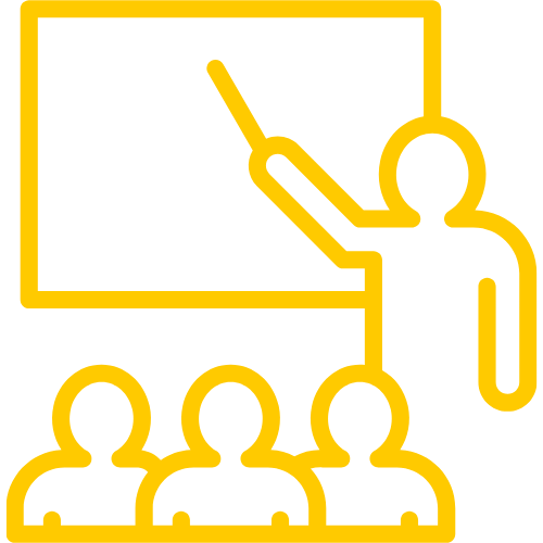 A person pointing at a presentation on a blackboard, with an audience of four people watching.