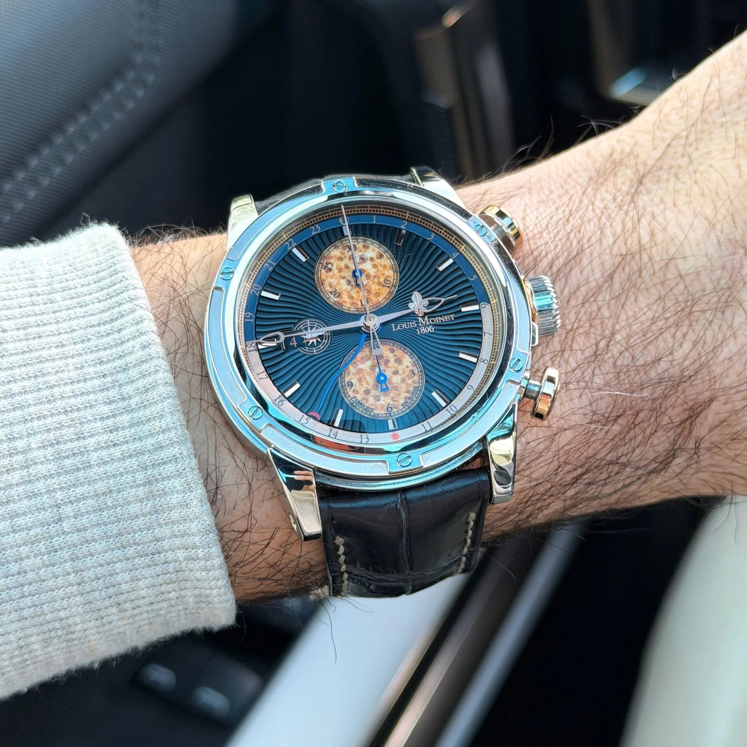 Louis Moinet Geograph Rainforest chronograph with fossilized palm wood dial, green accents, and stainless steel case with rose gold details