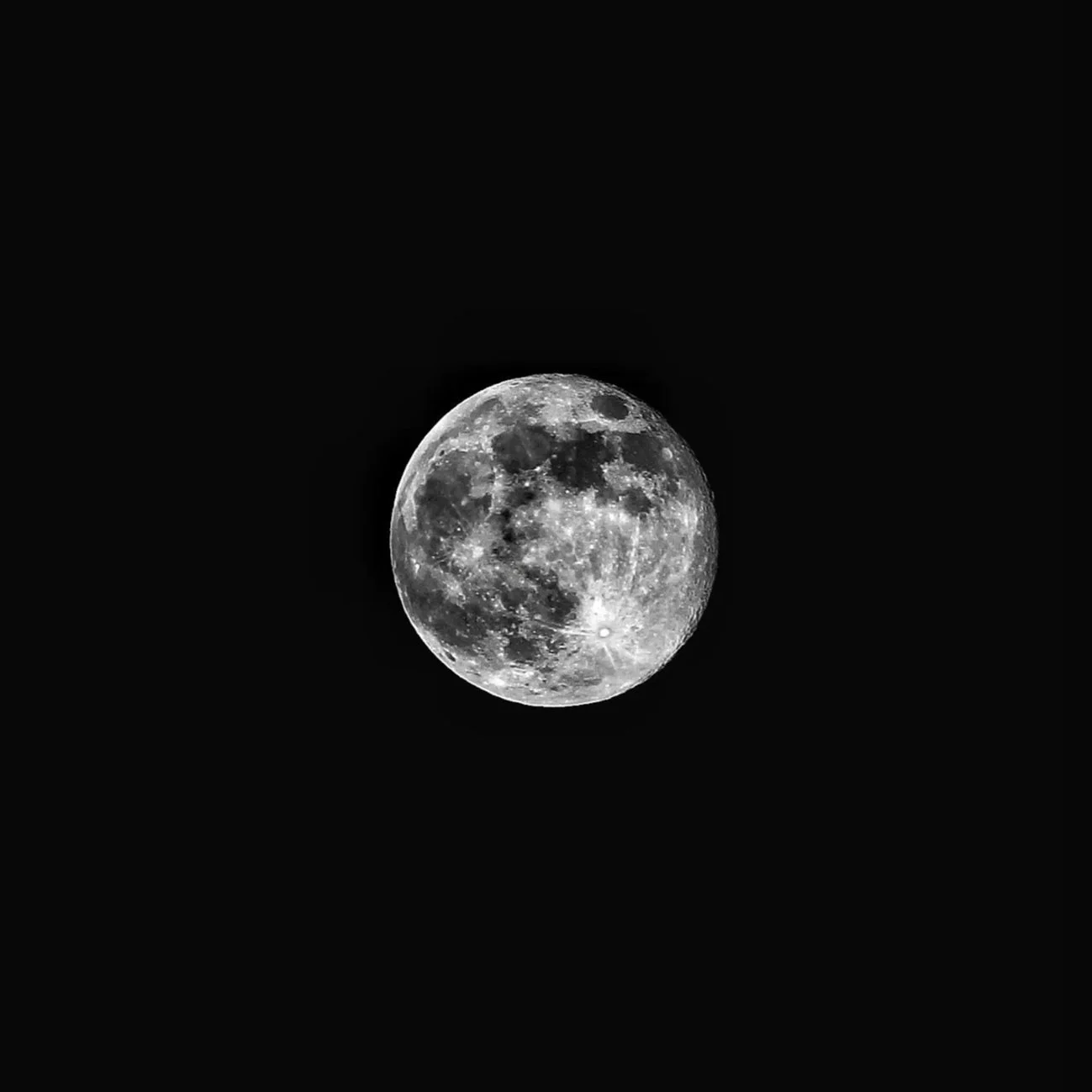 Full moon against a dark night sky.