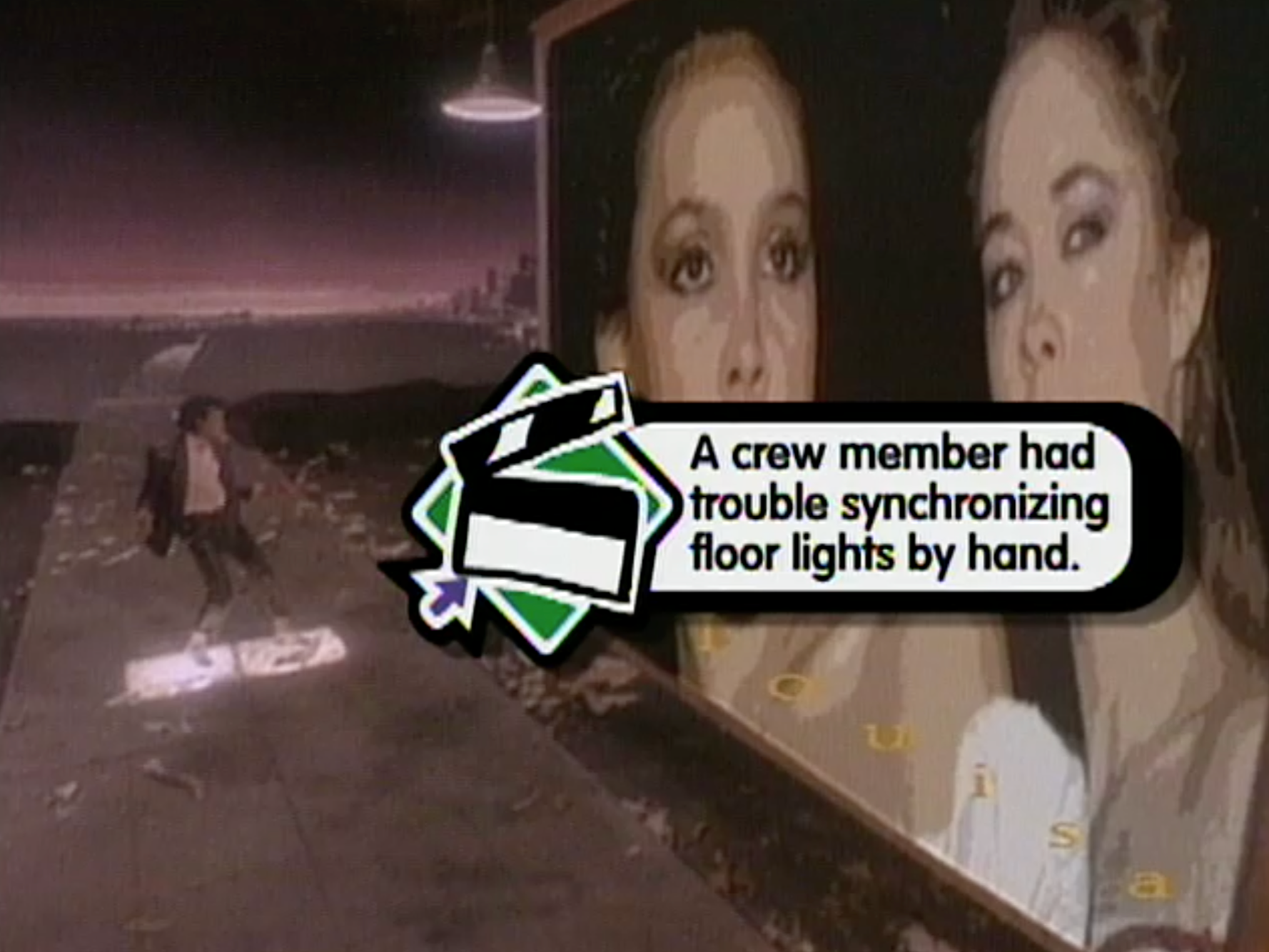 A person walking past a large billboard with a face of a woman and a commercial message about trouble synchronizing floor lights.