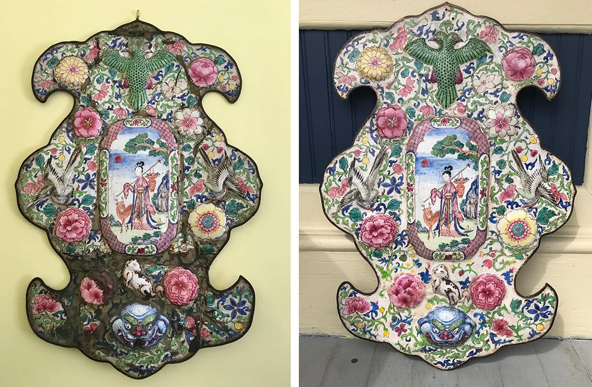 Colorful Chinese imperial art plaque with floral and animal motifs, and a central image of a woman with a parasol, surrounded by flowers and birds.