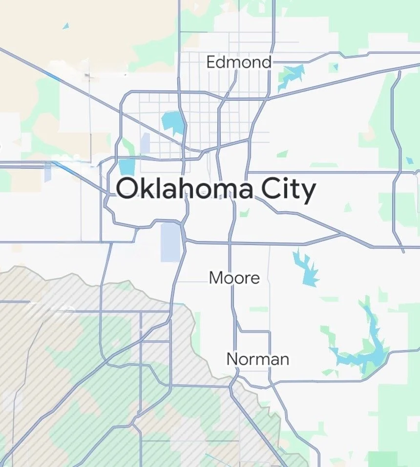Map showing Oklahoma City and surrounding areas including Edmond, Moore, and Norman, with roads and lakes.