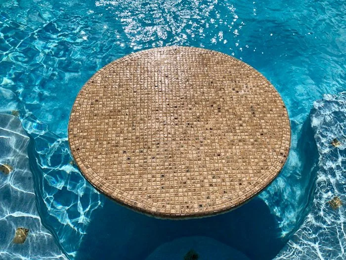 Custom bar table top inside swimming pool, Good Earth Pools, Oklahoma. 