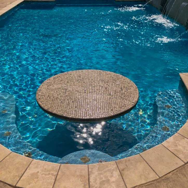 Custom table top inside swimming pool, Good Earth Pools,  Oklahoma.