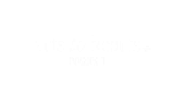 Logo for arts to hearts project with white text on black background.
