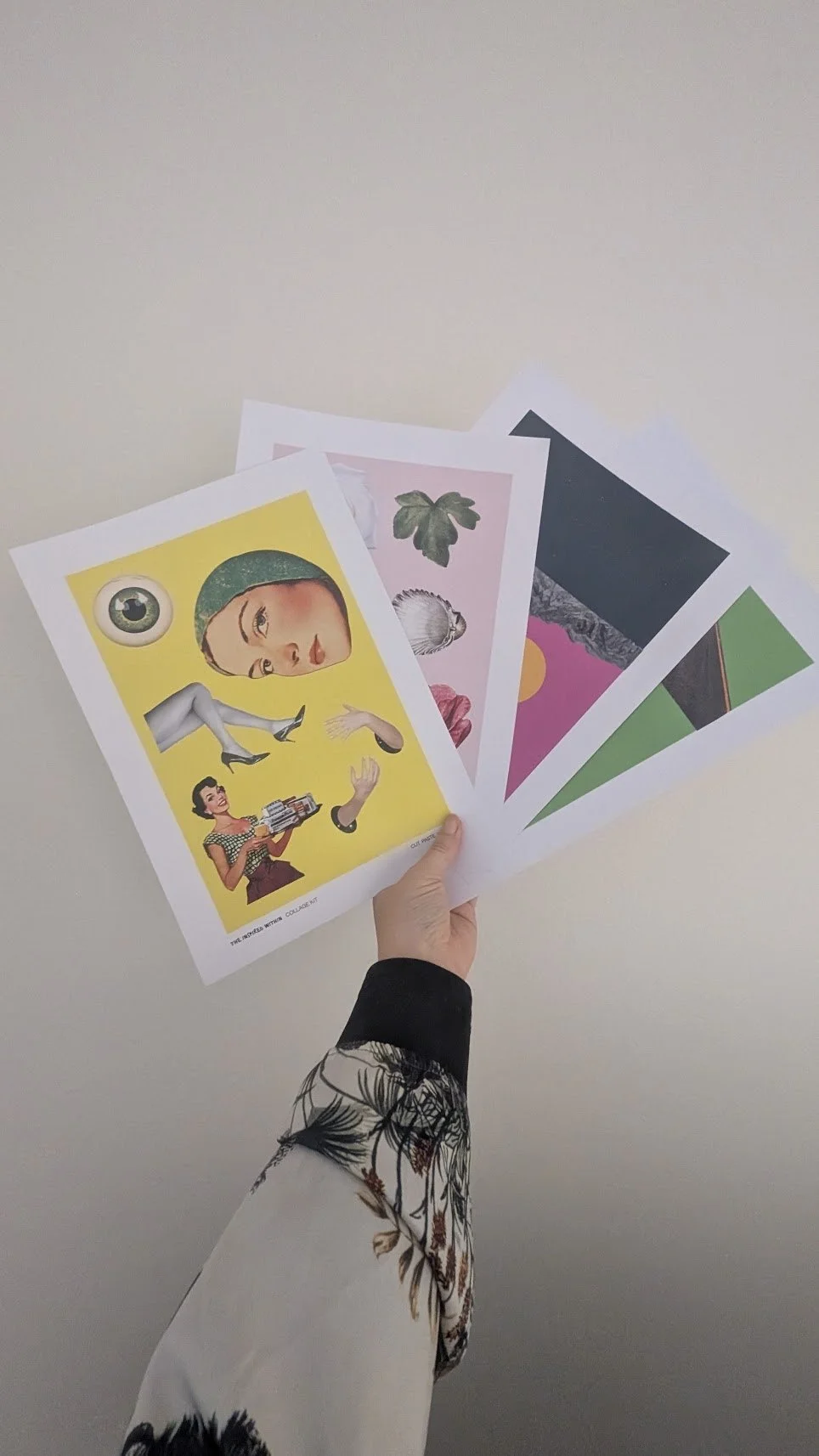 hand holding the collage kit