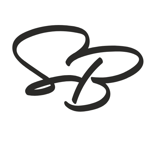 A black background with a stylized signature or abstract drawing in dark gray.