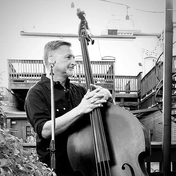 Dave Neilsen on stage with upright bass