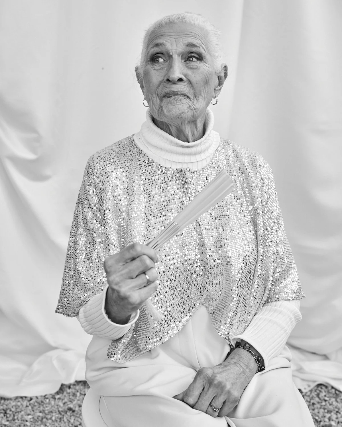 Portrait of Grandma looking fabulous at a Wedding. Photographed by a fashion photographer.