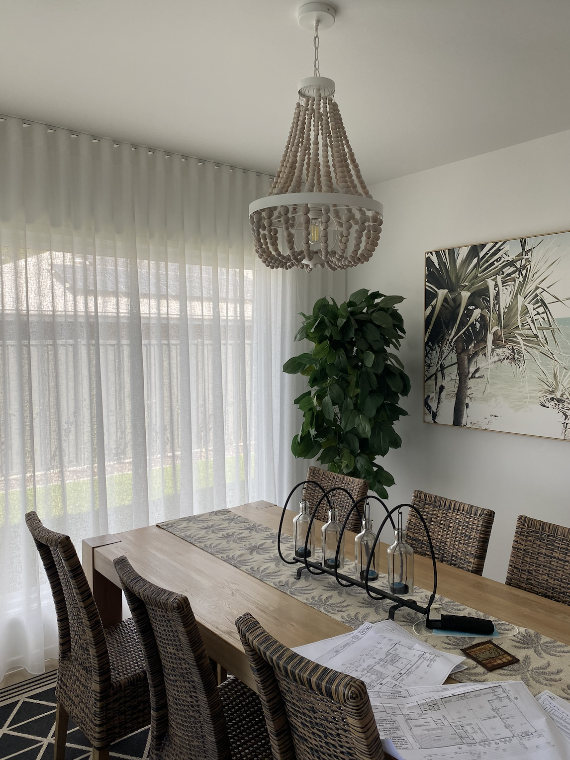Custom sheer curtains for a dining room.