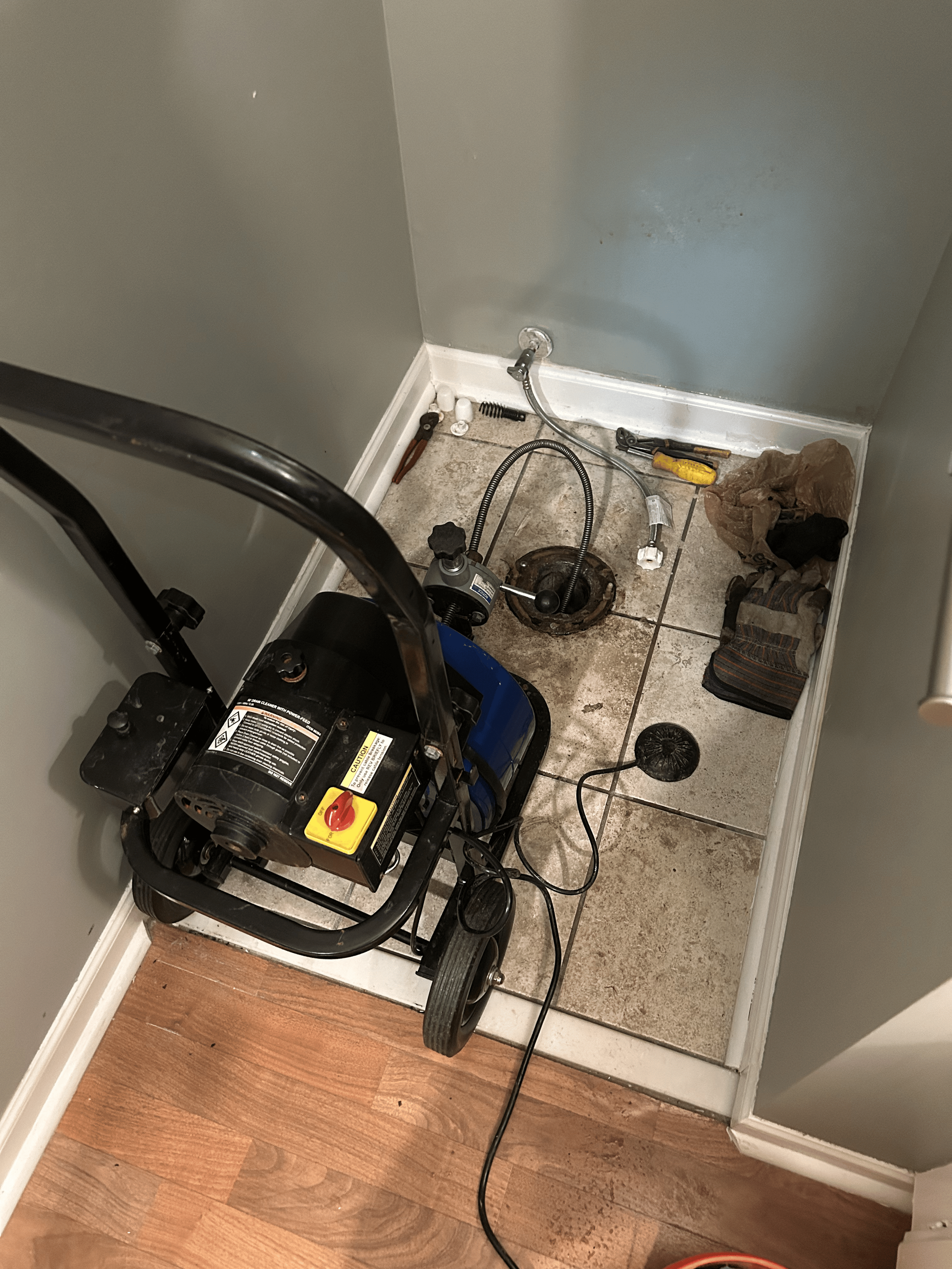 Emergency plumber repairing burst pipe and water leak in Nashville home