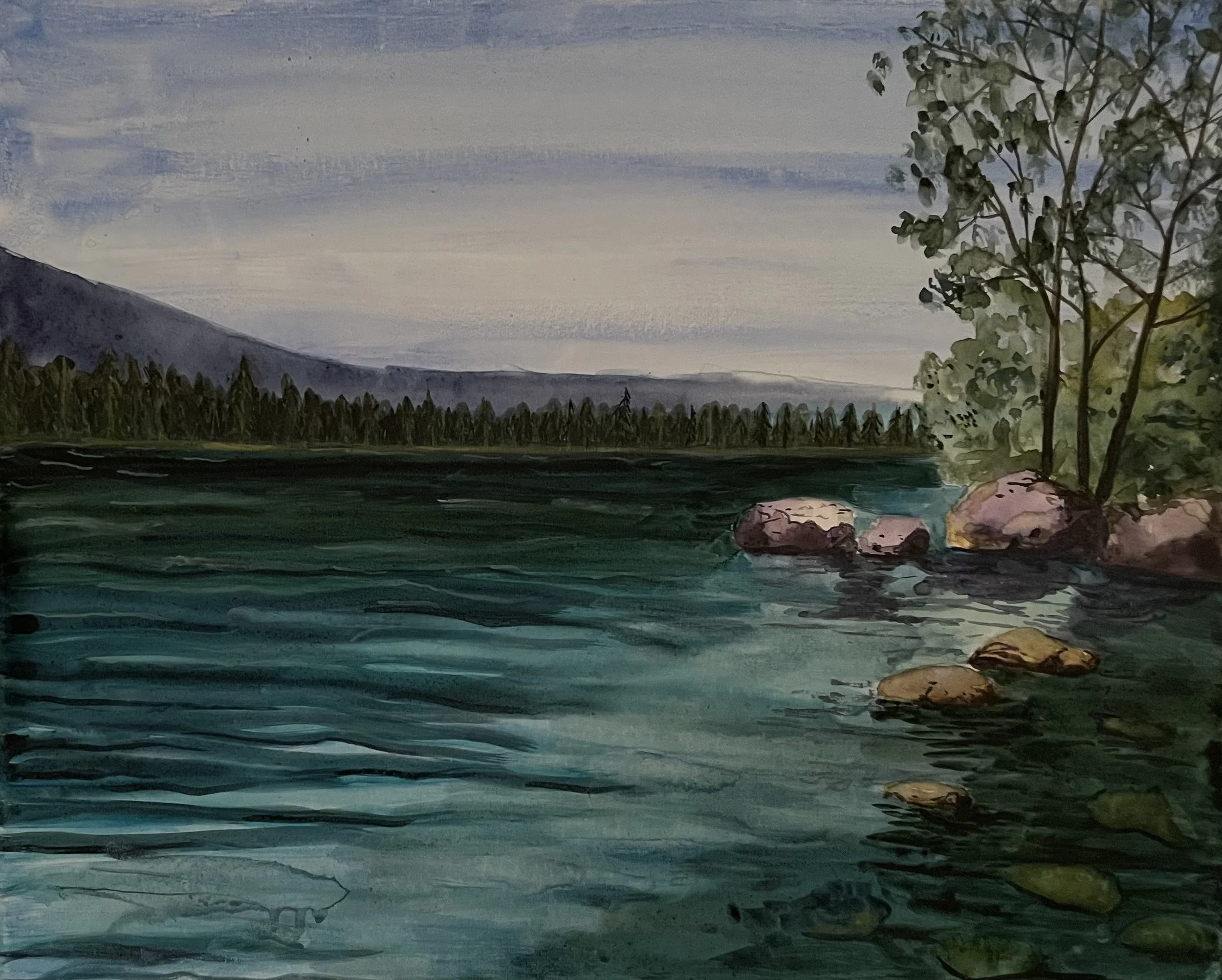 A watercolor painting of a river with rocks and trees along the bank, a dense forest in the background, and a mountain on the horizon, under a cloudy sky.